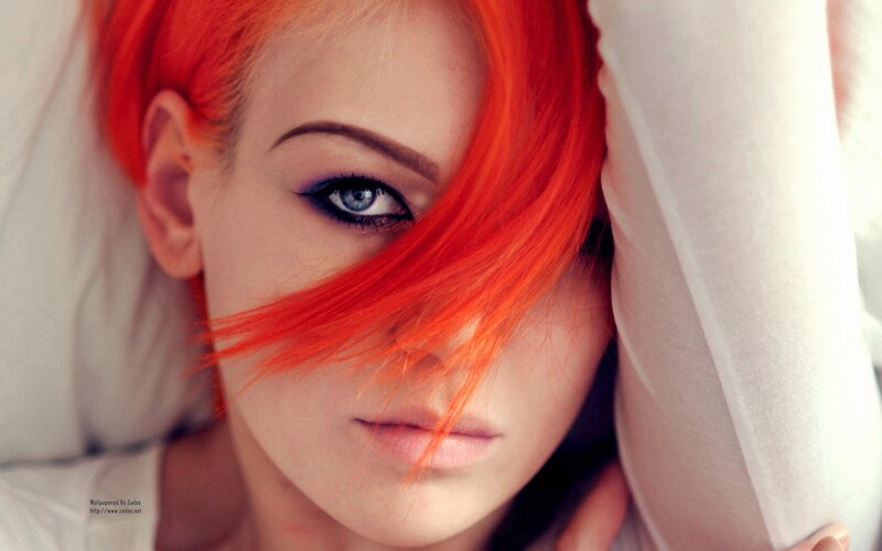 woman with red hair and blue eyes