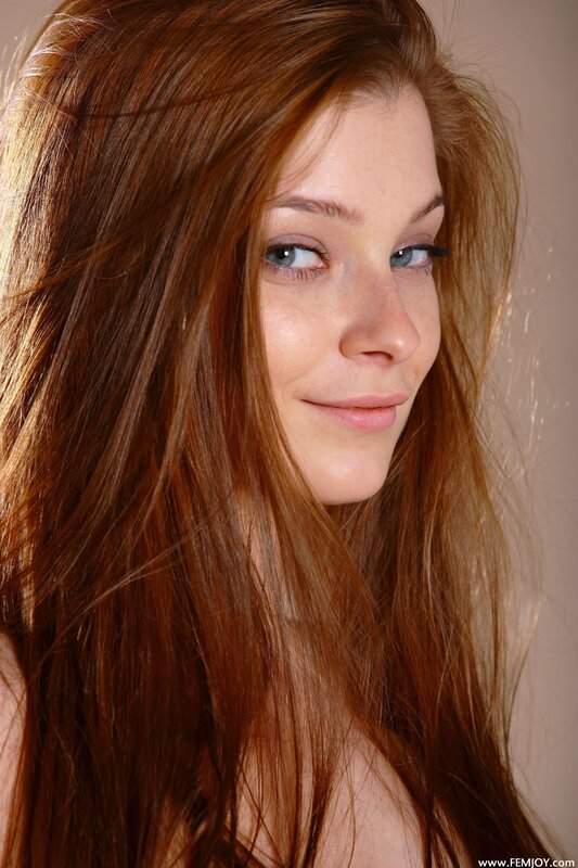 woman with red hair and blue eyes