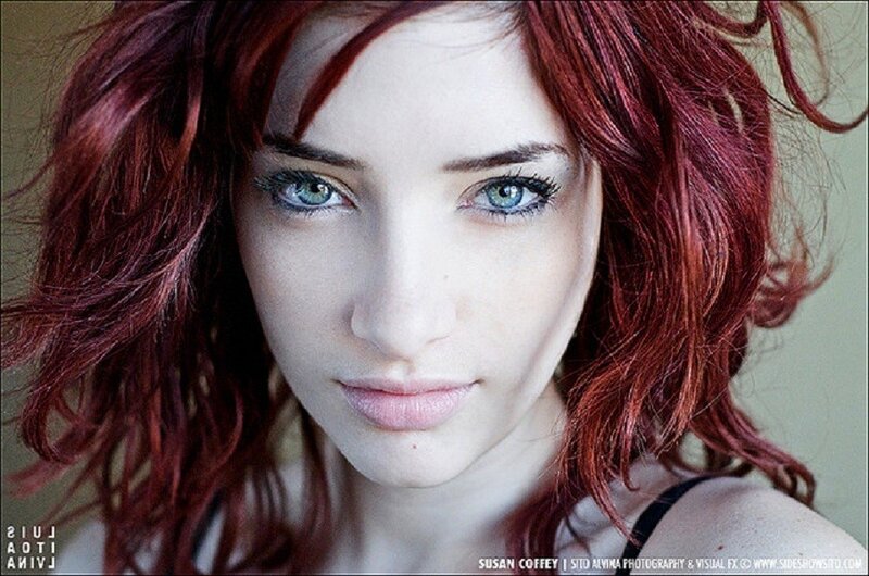 woman with red hair and blue eyes