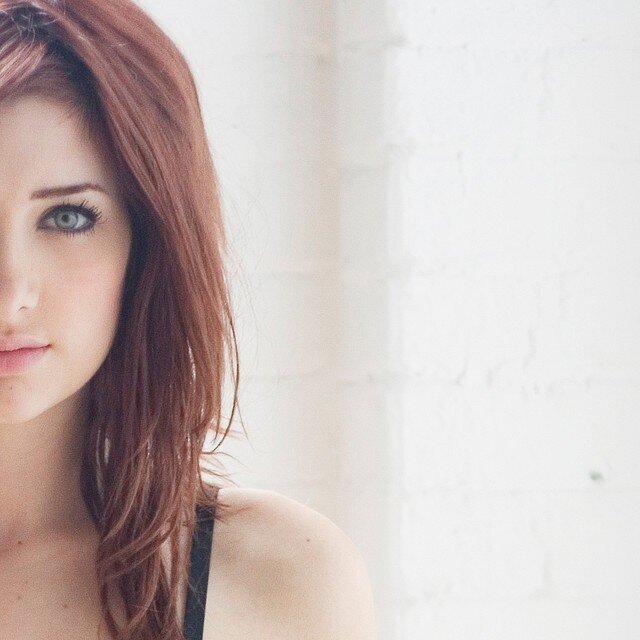 woman with red hair and blue eyes