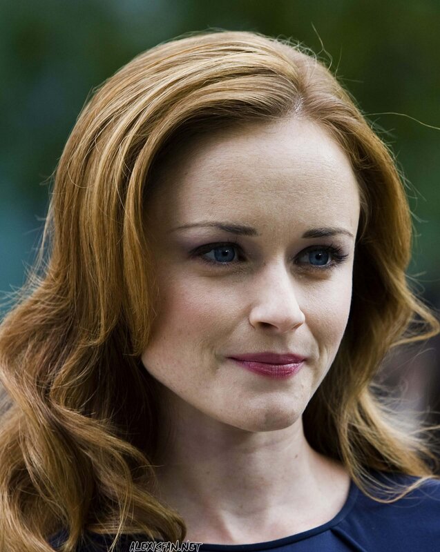 woman with red hair and blue eyes