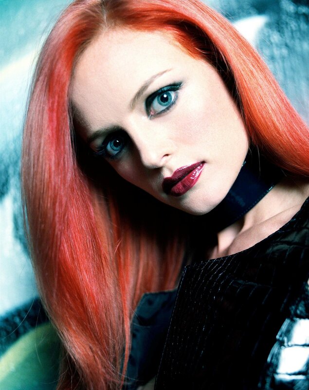woman with red hair and blue eyes