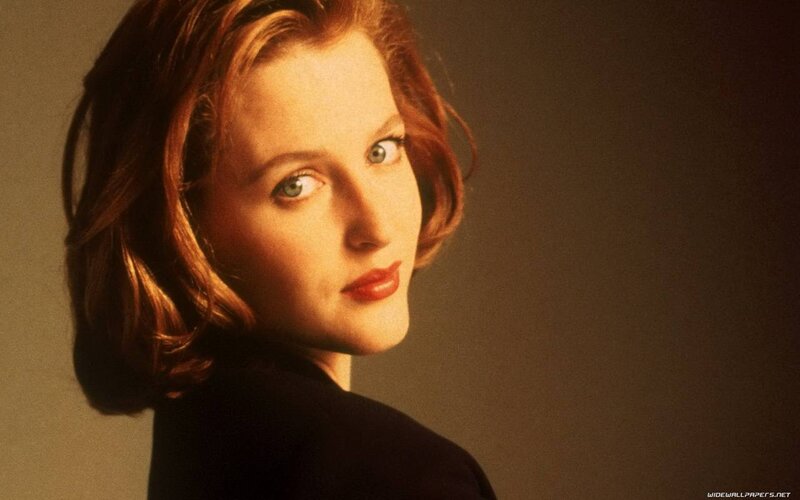 woman with red hair and blue eyes