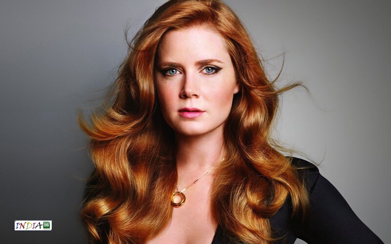 woman with red hair and blue eyes