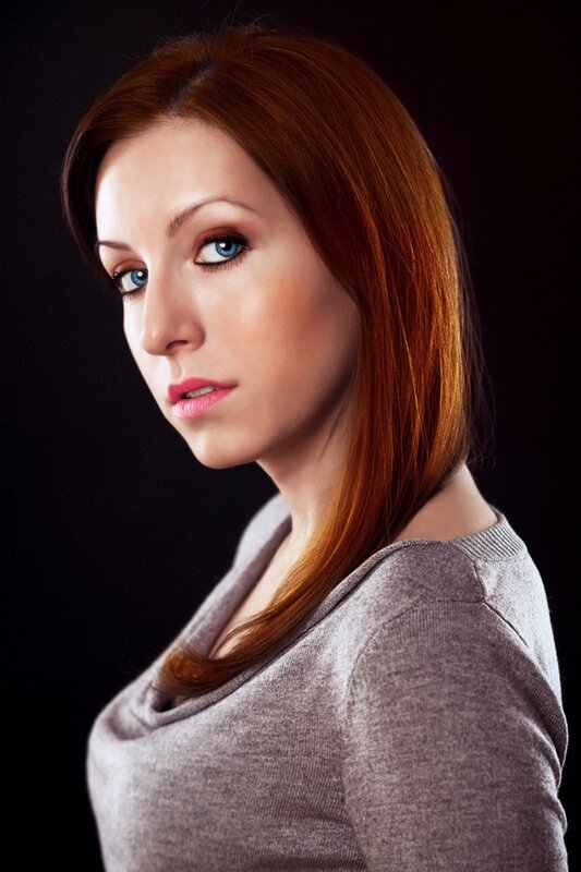 woman with red hair and blue eyes