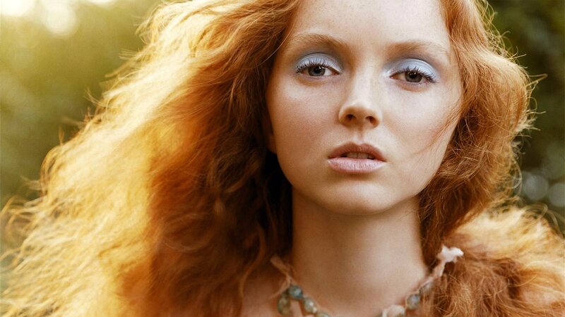 woman with red hair and blue eyes