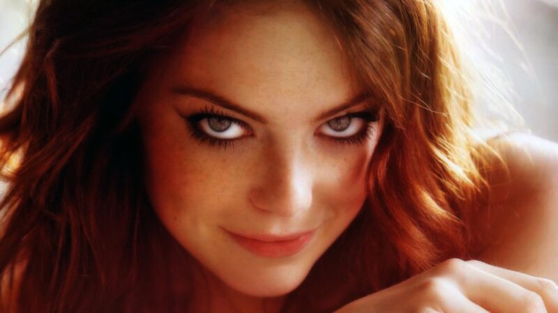 woman with red hair and blue eyes