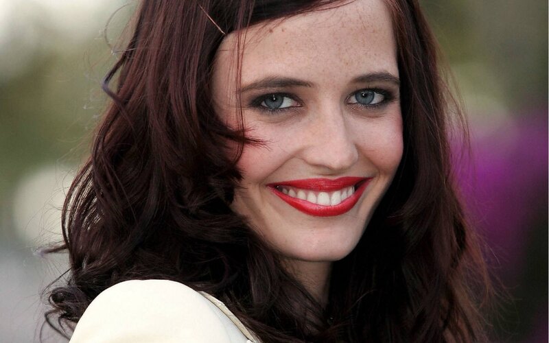 woman with red hair and blue eyes