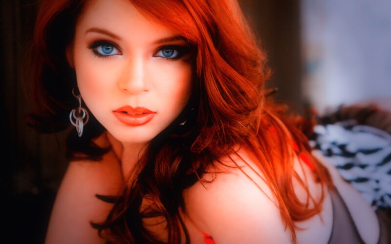 woman with red hair and blue eyes