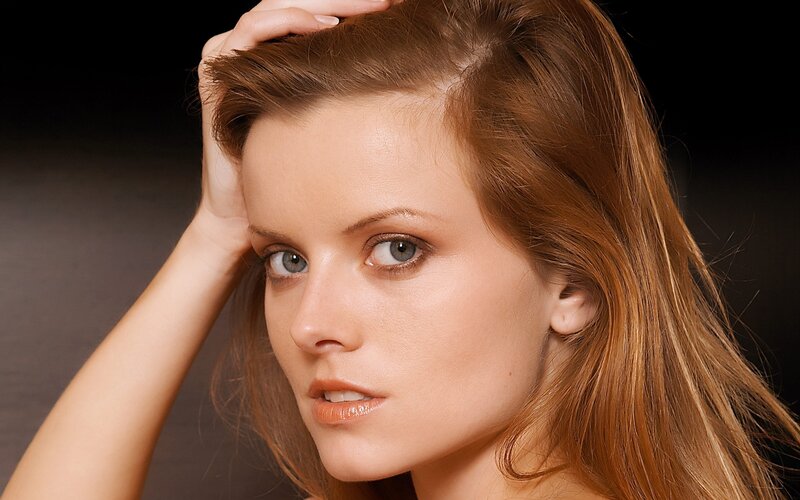 woman with red hair and blue eyes