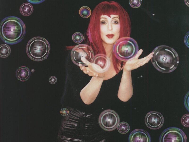 woman with red hair and bubbles