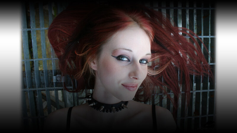 woman with red hair and choker