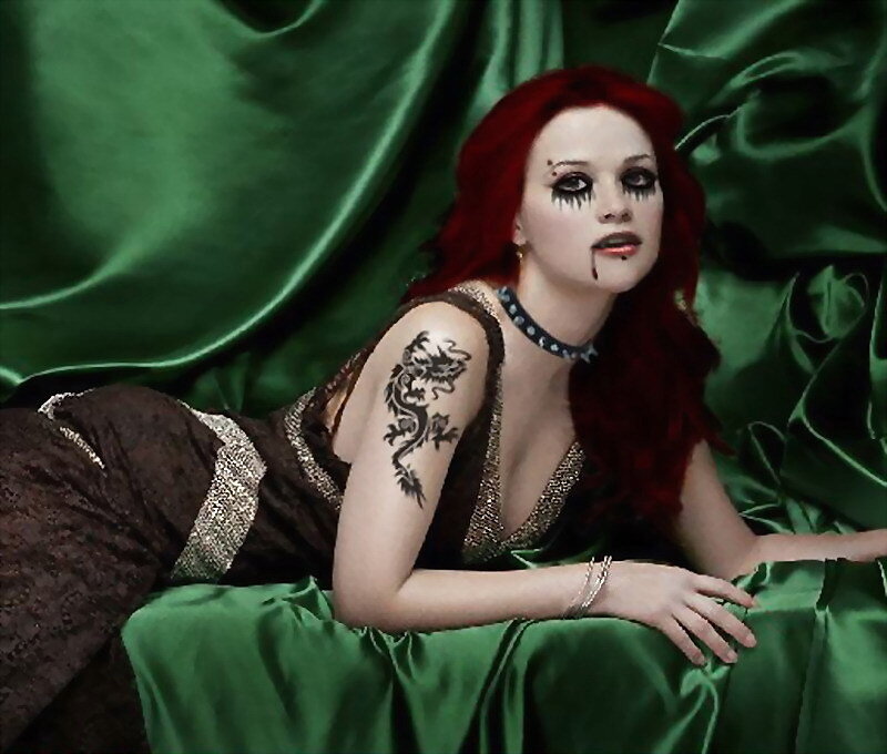 woman with red hair and dragon tattoo