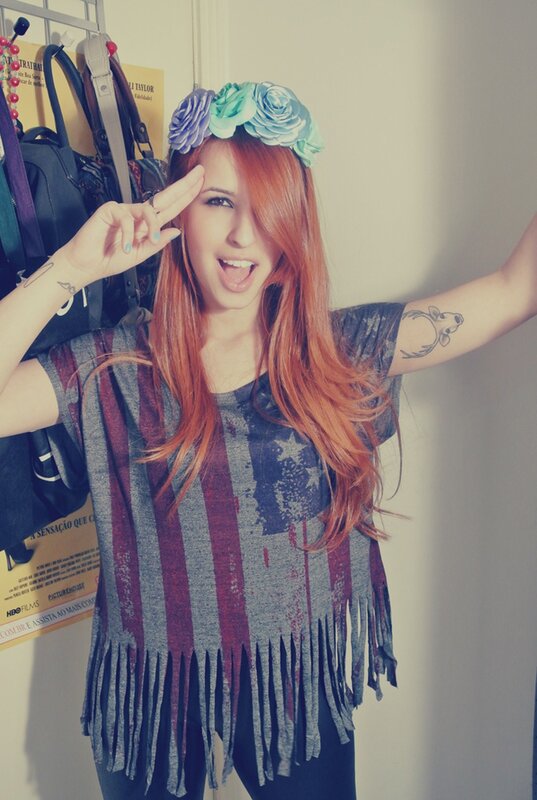 woman with red hair and flower crown