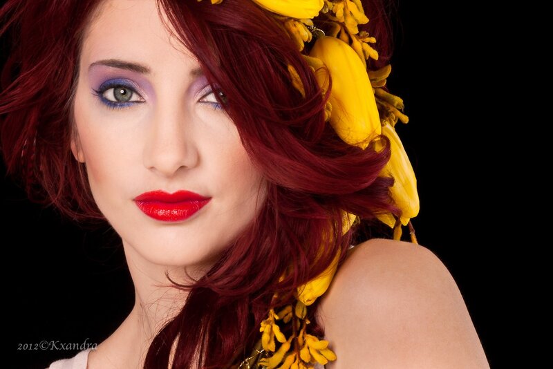 woman with red hair and flowers