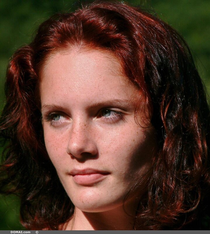 woman with red hair and freckles