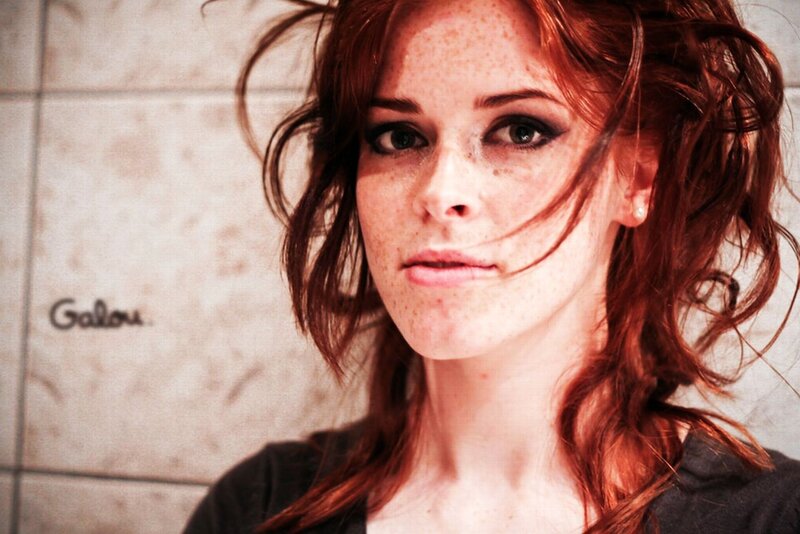 woman with red hair and freckles