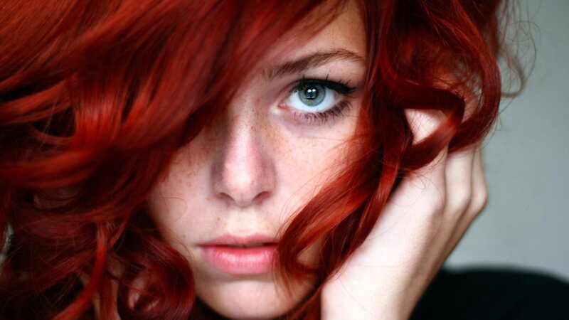 woman with red hair and freckles