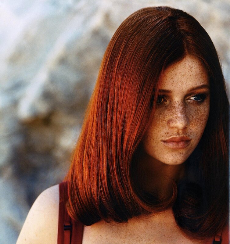 woman with red hair and freckles