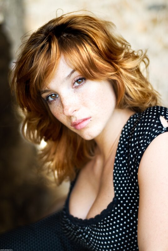 woman with red hair and freckles