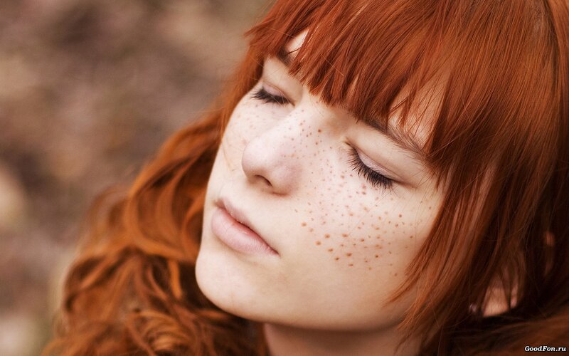 woman with red hair and freckles