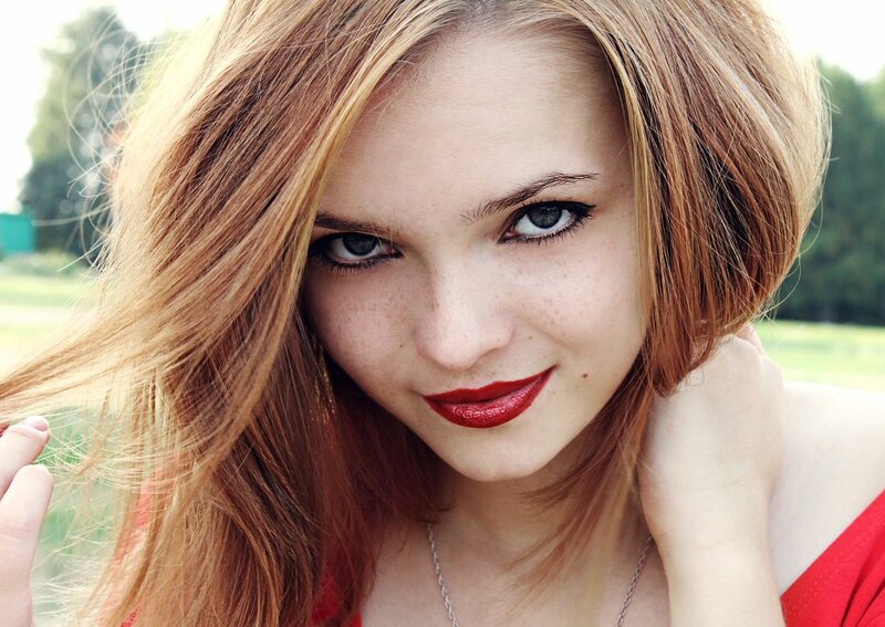 woman with red hair and freckles