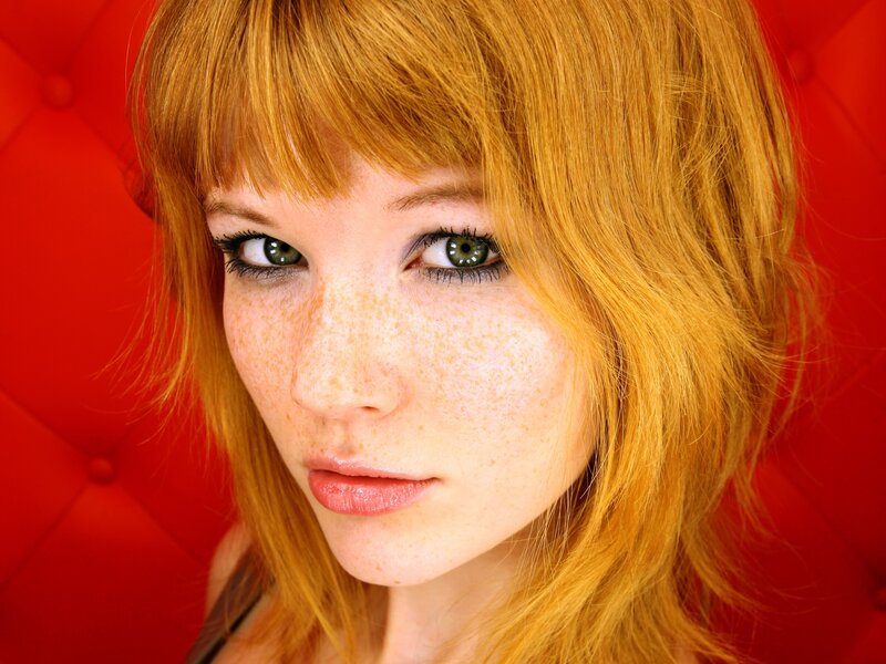 woman with red hair and freckles