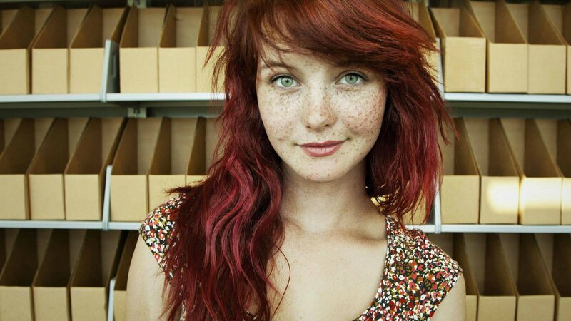 woman with red hair and freckles