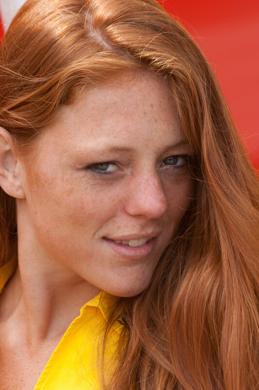 woman with red hair and freckles