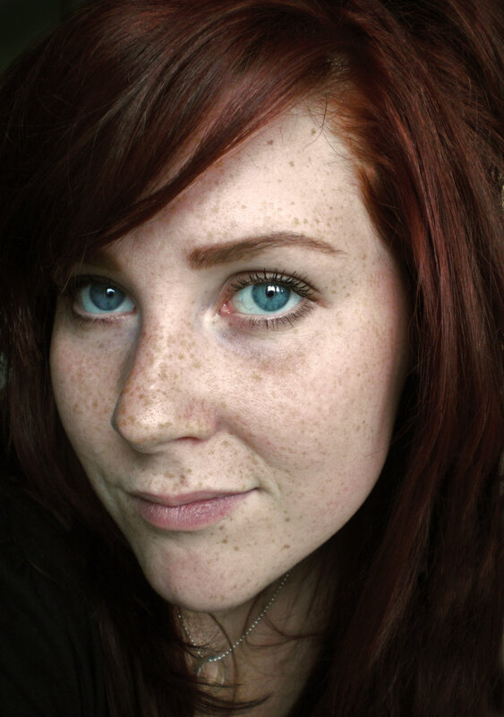 woman with red hair and freckles