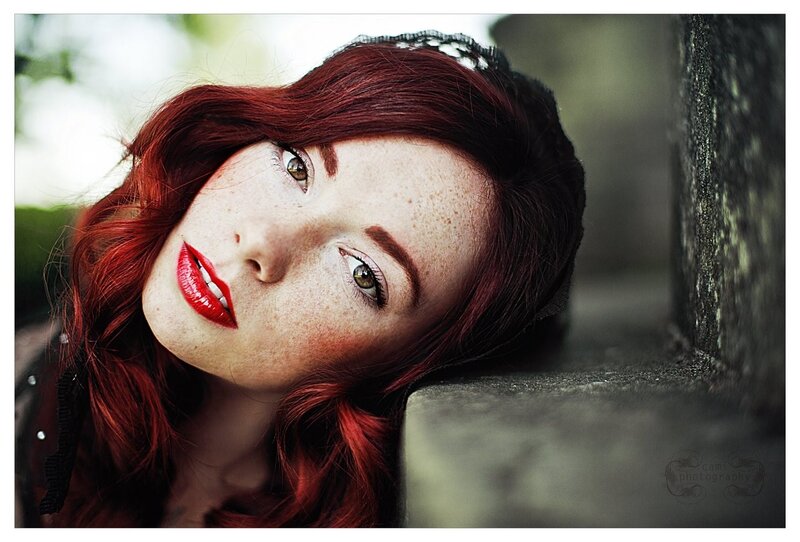 woman with red hair and freckles