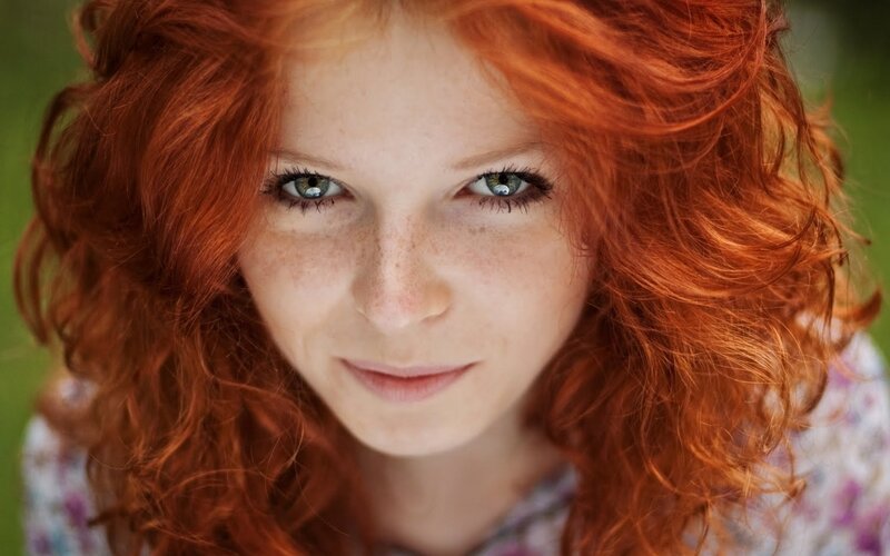 woman with red hair and freckles
