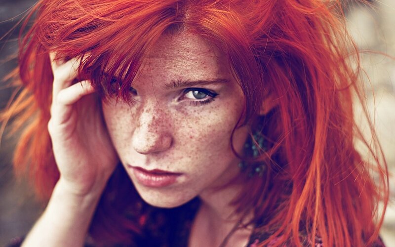 woman with red hair and freckles