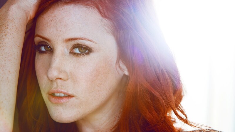 woman with red hair and freckles