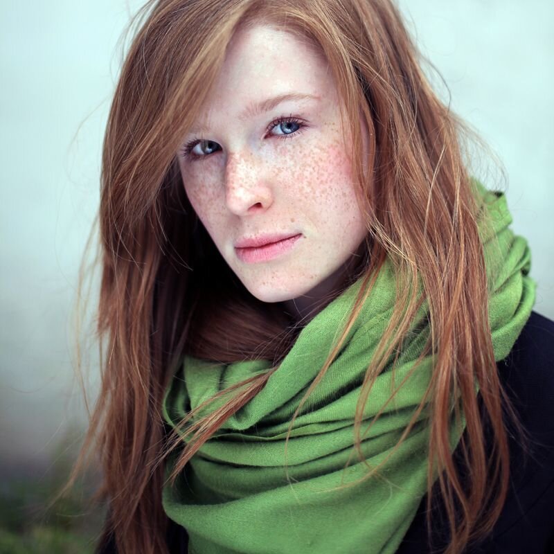 woman with red hair and freckles