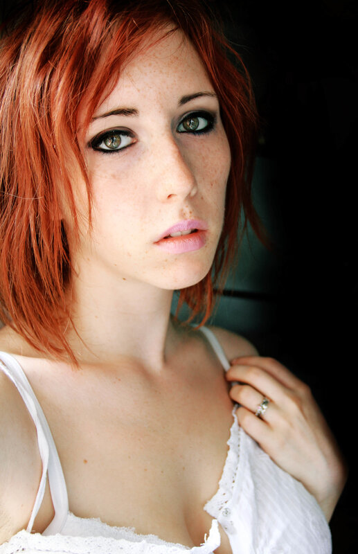 woman with red hair and freckles