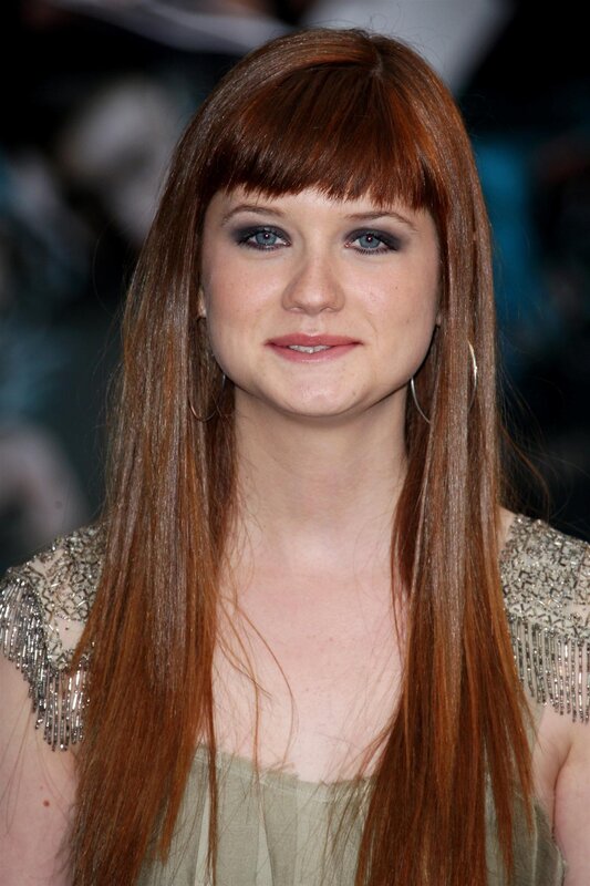 woman with red hair and fringe
