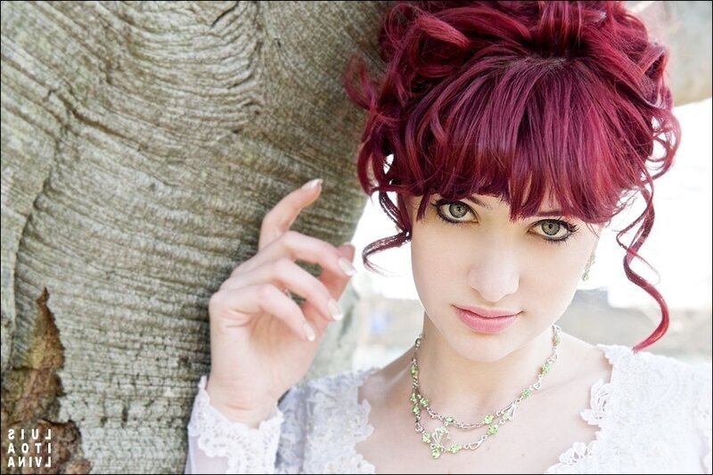 woman with red hair and green eyes