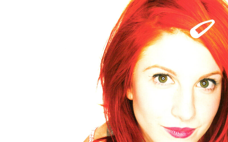 woman with red hair and green eyes