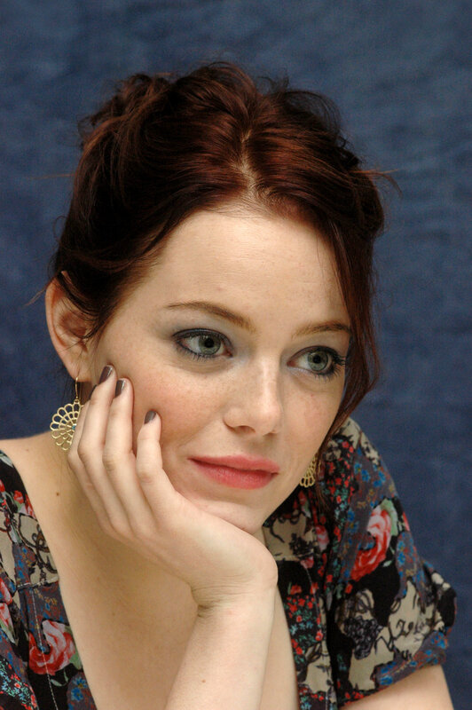 woman with red hair and green eyes