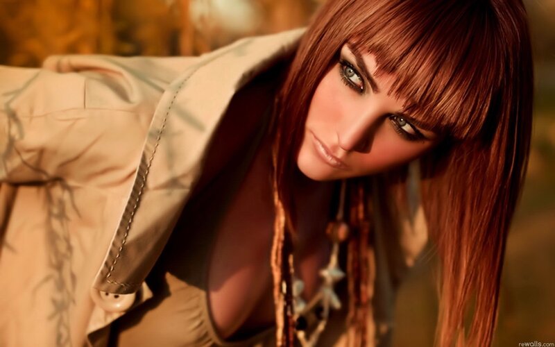 woman with red hair and green eyes