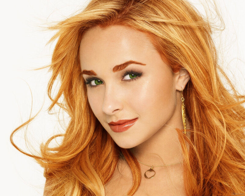 woman with red hair and green eyes