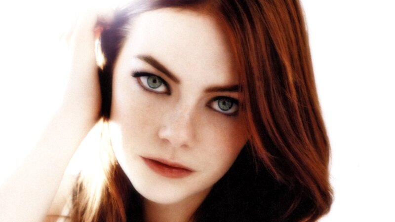 woman with red hair and green eyes