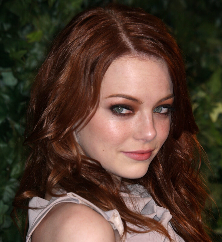 woman with red hair and green eyes