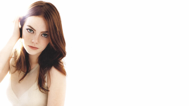 woman with red hair and green eyes