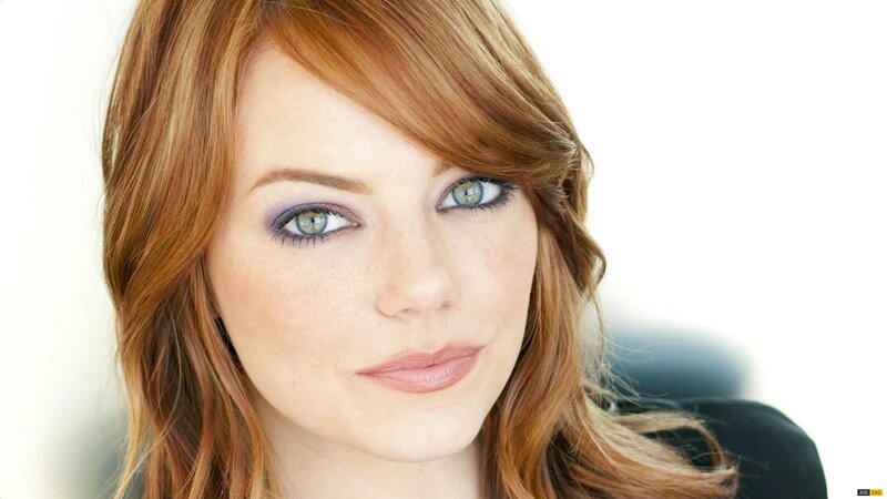 woman with red hair and green eyes