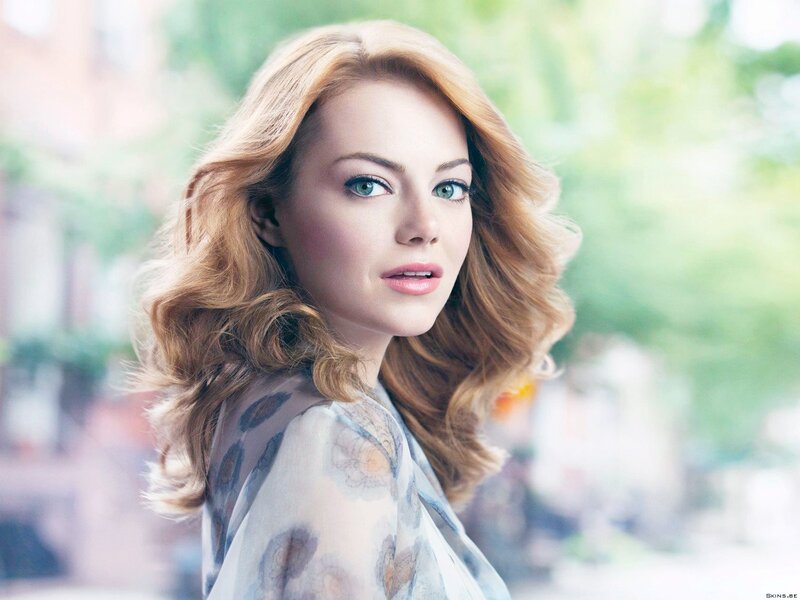 woman with red hair and green eyes