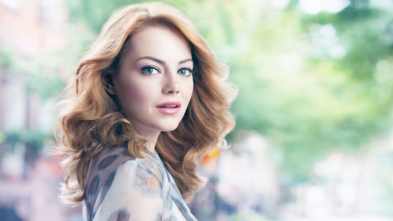 woman with red hair and green eyes