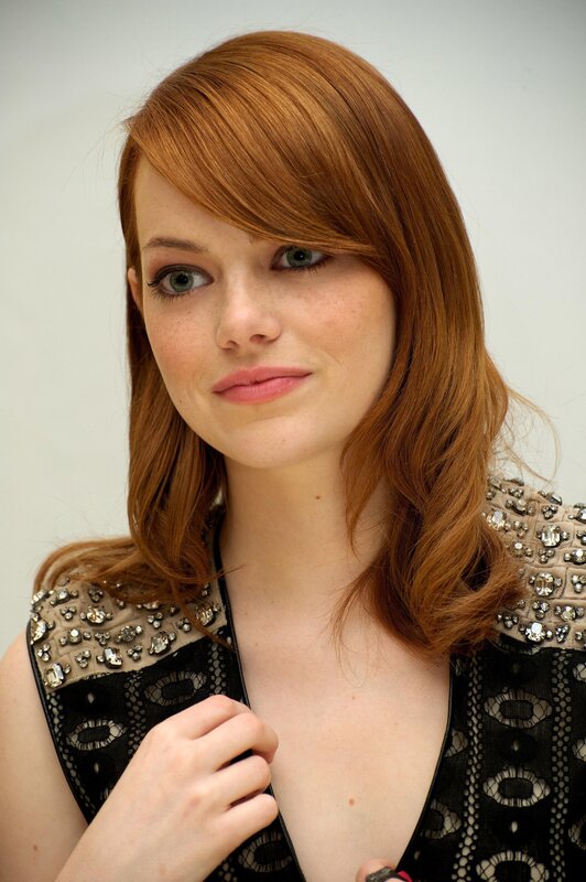 woman with red hair and green eyes