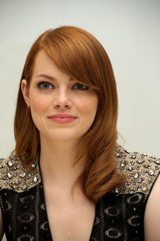 woman with red hair and green eyes